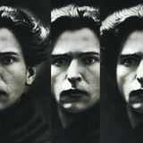 A monochromatic triptych of a photograph of George Enescu.